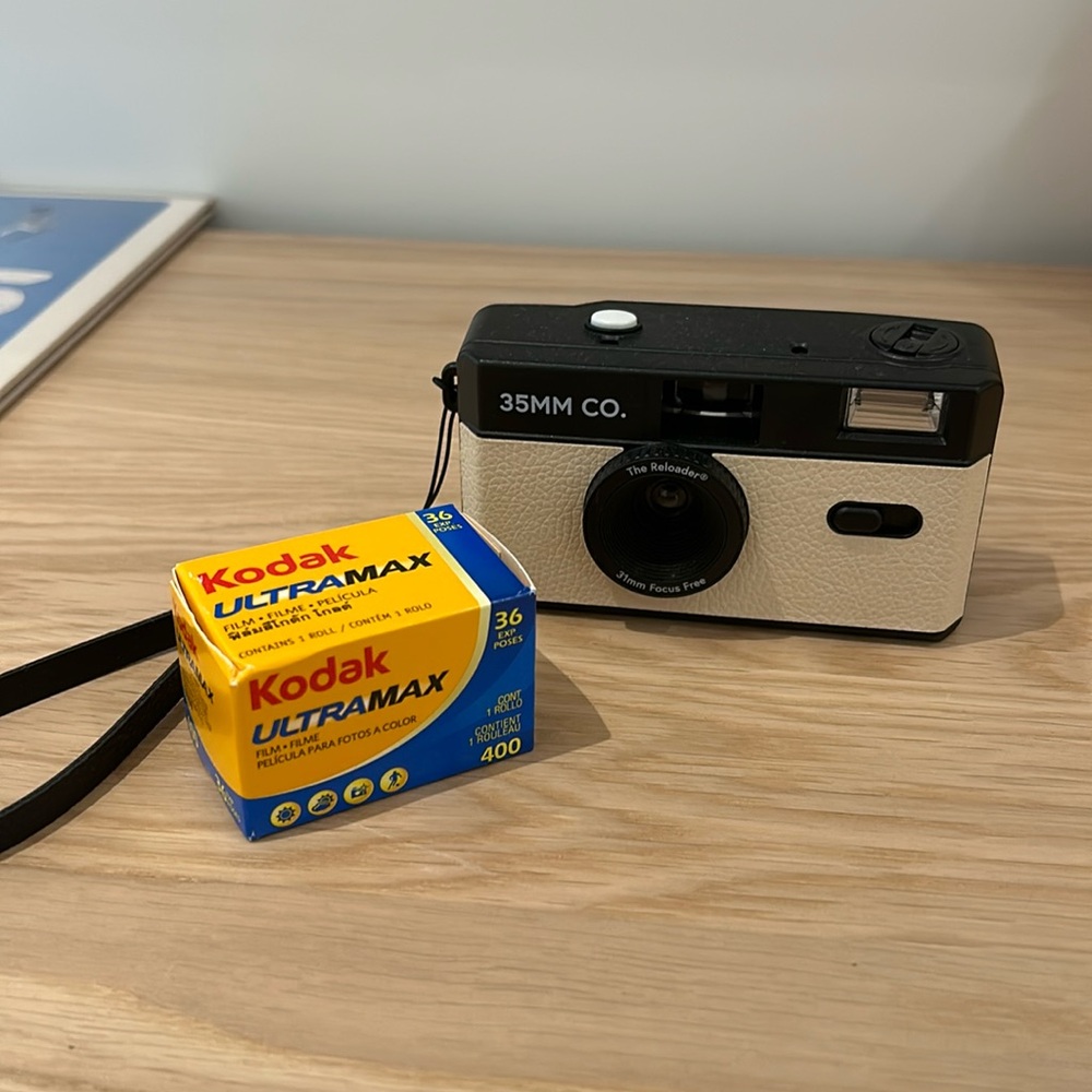 35mm Co Film Camera + 1 roll of film preloaded